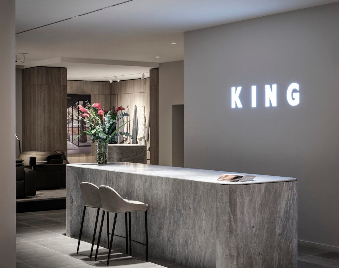 Image shows a large grey marble point of sale in King Living
